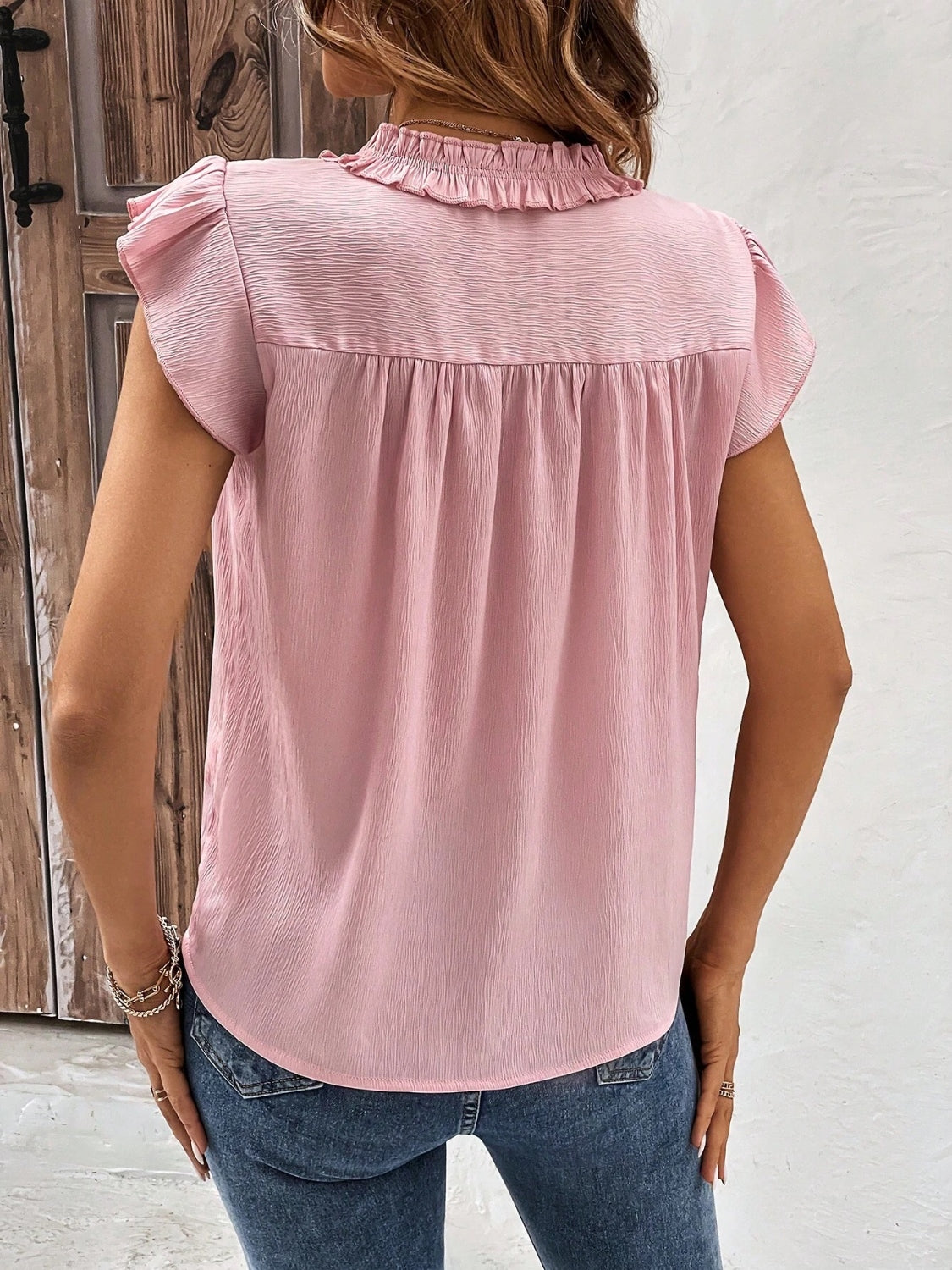 Blusa con mangas japonesas y muescas