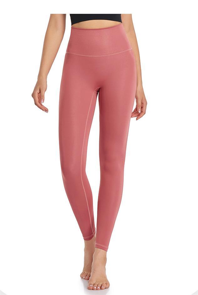 Ropa de yoga de talla grande Bolsillo de cintura alta Sensación desnuda Pantalones de entrenamiento para correr Pantalones ajustados de fitness de compresión de secado rápido con levantamiento de cadera color melocotón para mujeres