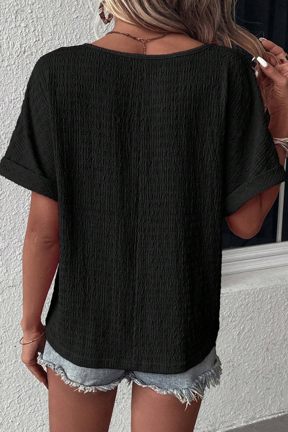 Blusa de manga corta con cuello en V