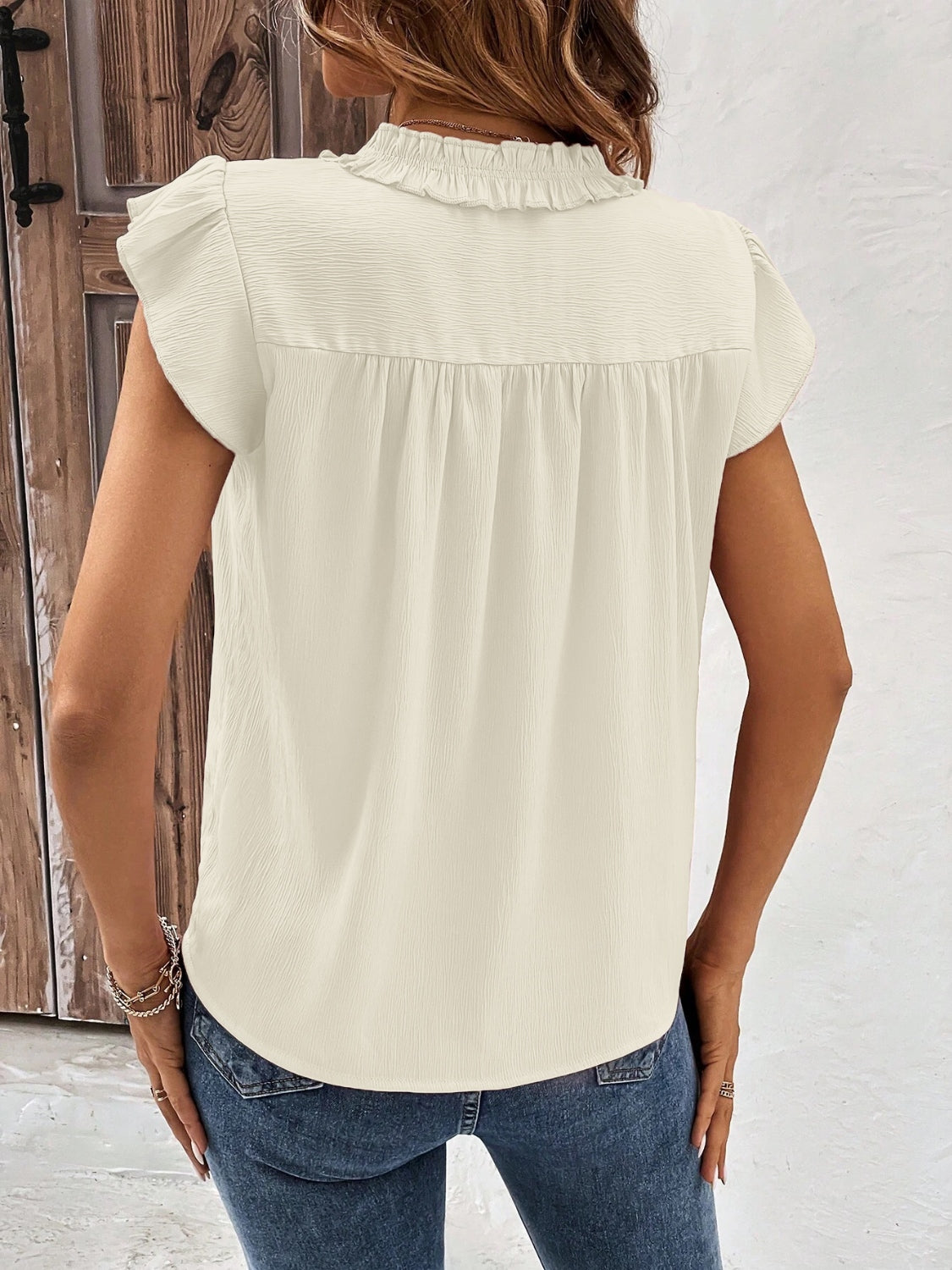 Blusa con mangas japonesas y muescas