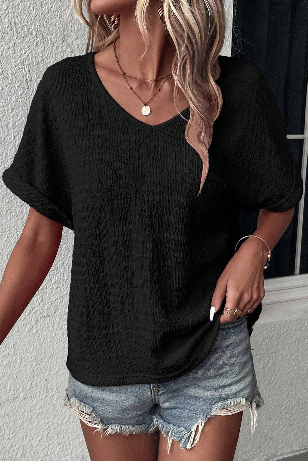 Blusa de manga corta con cuello en V