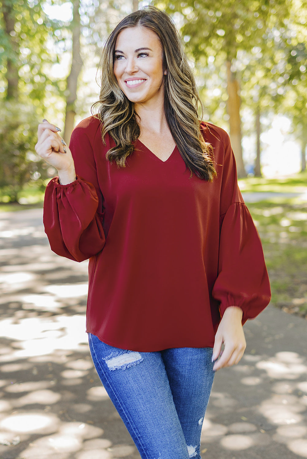 Blusa con mangas globo y muescas fruncidas