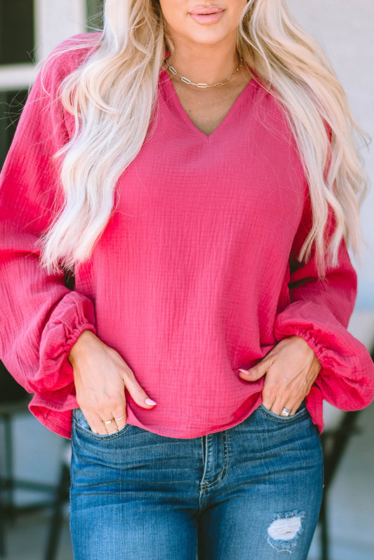 Blusa con mangas globo y muescas