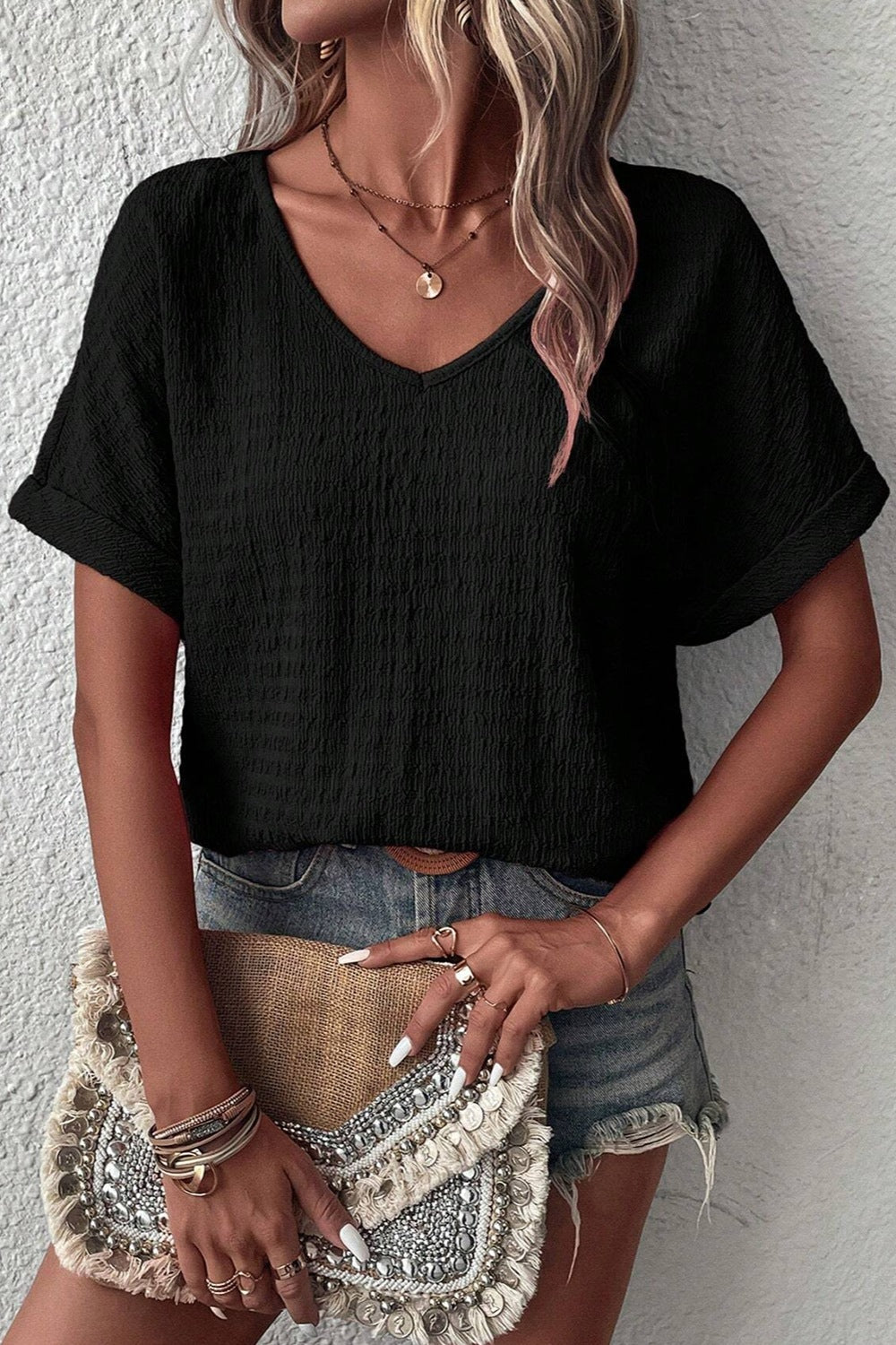 Blusa de manga corta con cuello en V