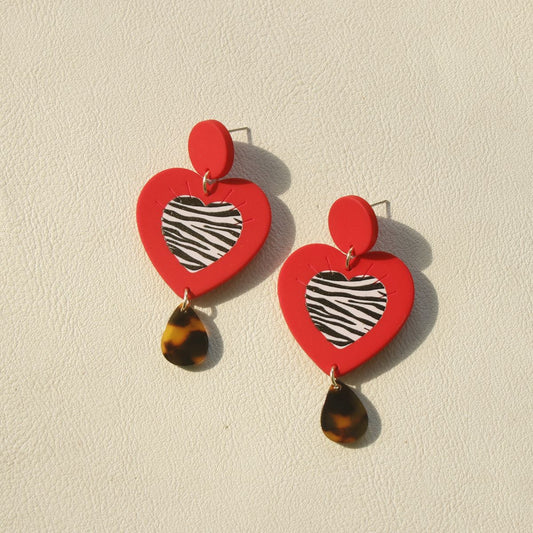 Boucles d'oreilles acryliques géométriques contrastées